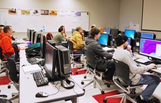 students studying at computer stations