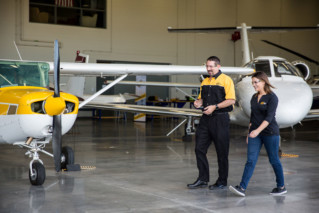 Instructor and student walking together