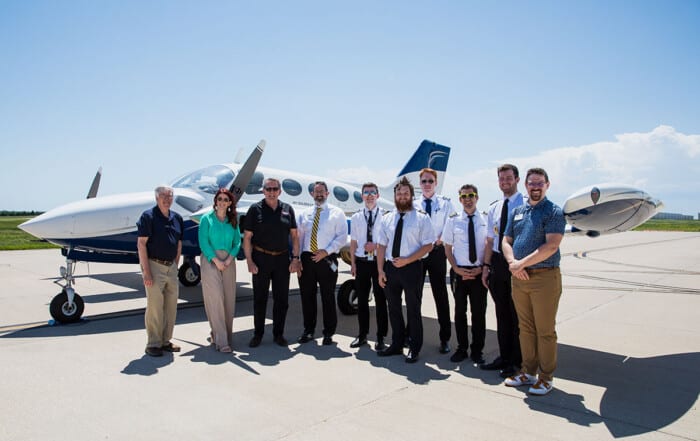 Air Capital Legacy Lives On Through Cessna 421 Donation to WSU Tech - Group Photo in front of plane
