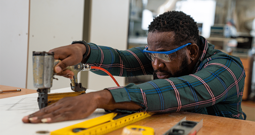 open-education-construction-student WSU Tech | Open Education | Construction Student Working in Shop