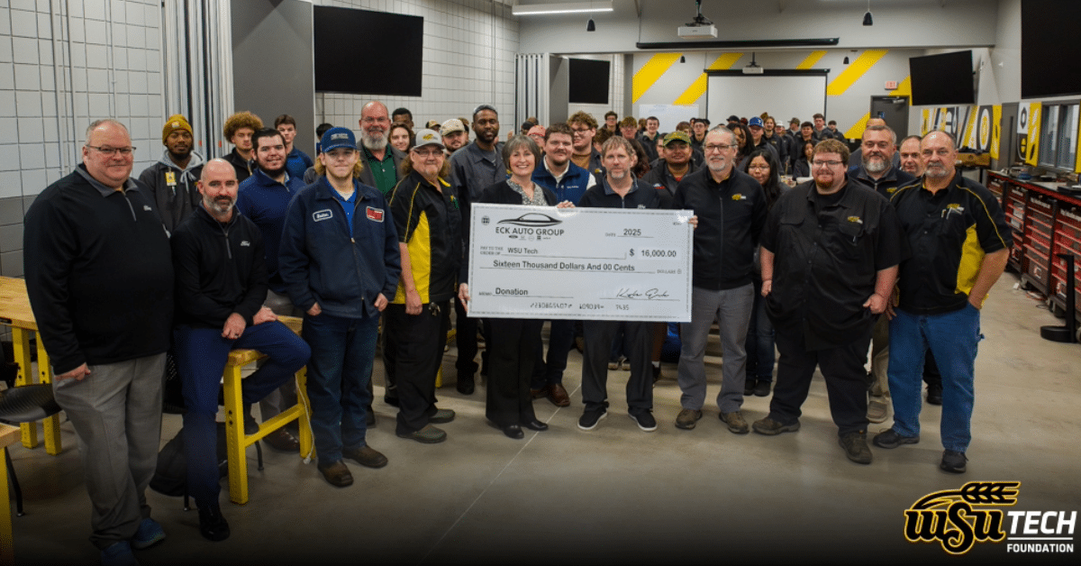 Rusty Eck Ford Invests in WSU Tech Automotive Students with New Contribution - Group with check photo