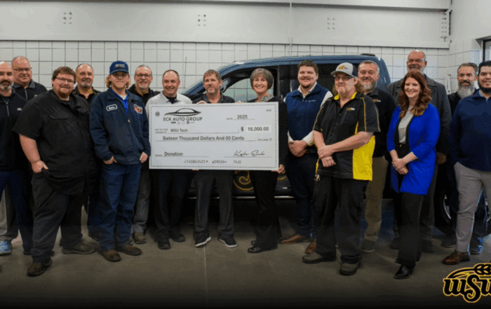 Rusty Eck Ford Invests in WSU Tech Automotive Students with New Contribution - Foundation plus group with check photo