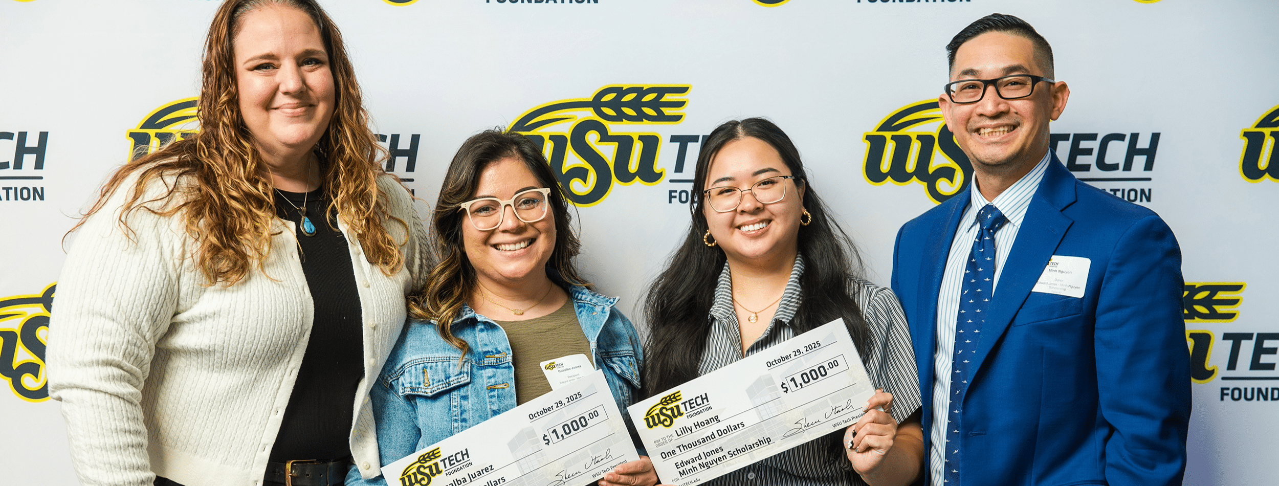 foundation-scholarships-check-group-photo-2-1 WSU Tech Foundation Scholarship recipients with checks at award luncheon.