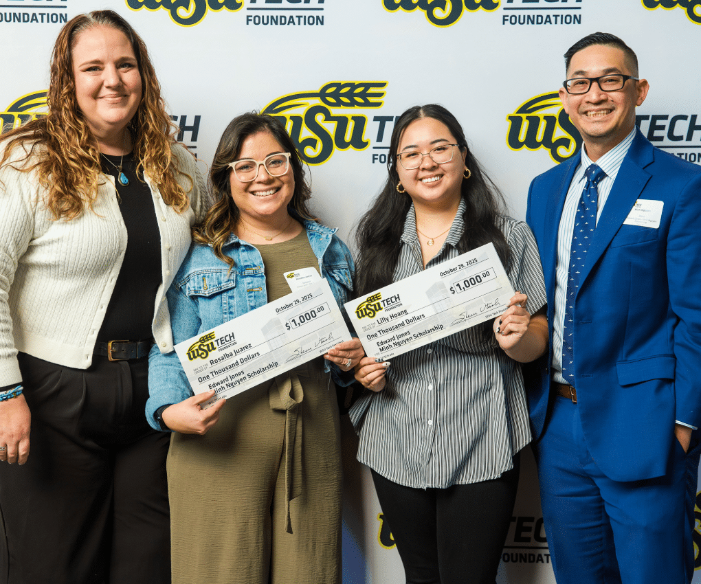 foundation-scholarships-check-group-photo-3-1 WSU Tech Foundation Scholarship recipients with checks at award luncheon.