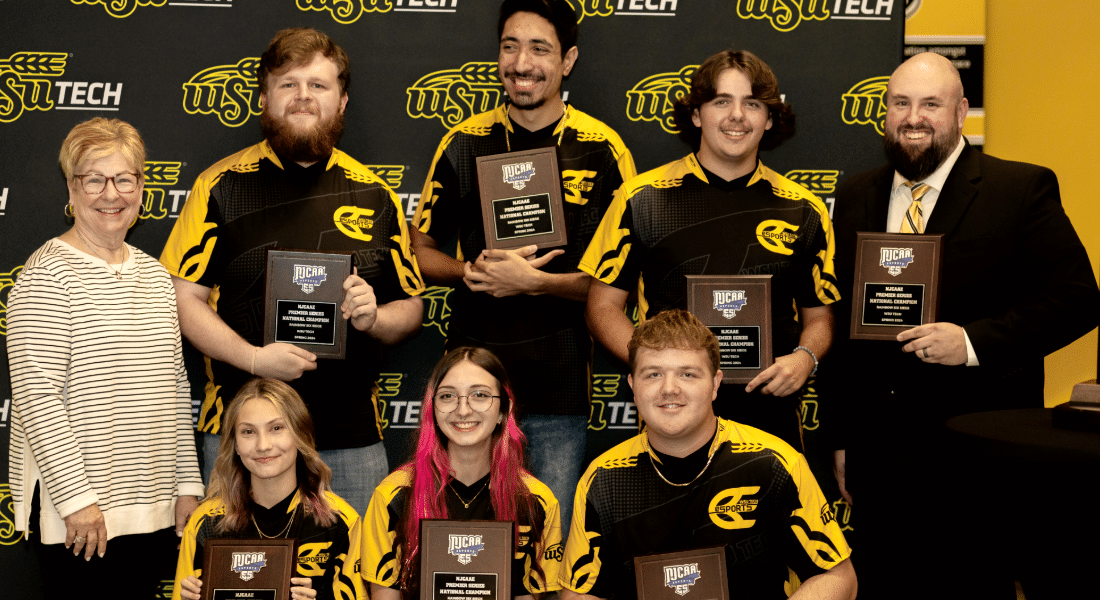 student-resources-hub-esports WSU Tech eSports team members pose with championship awards, representing competitive gaming, teamwork, and student involvement.