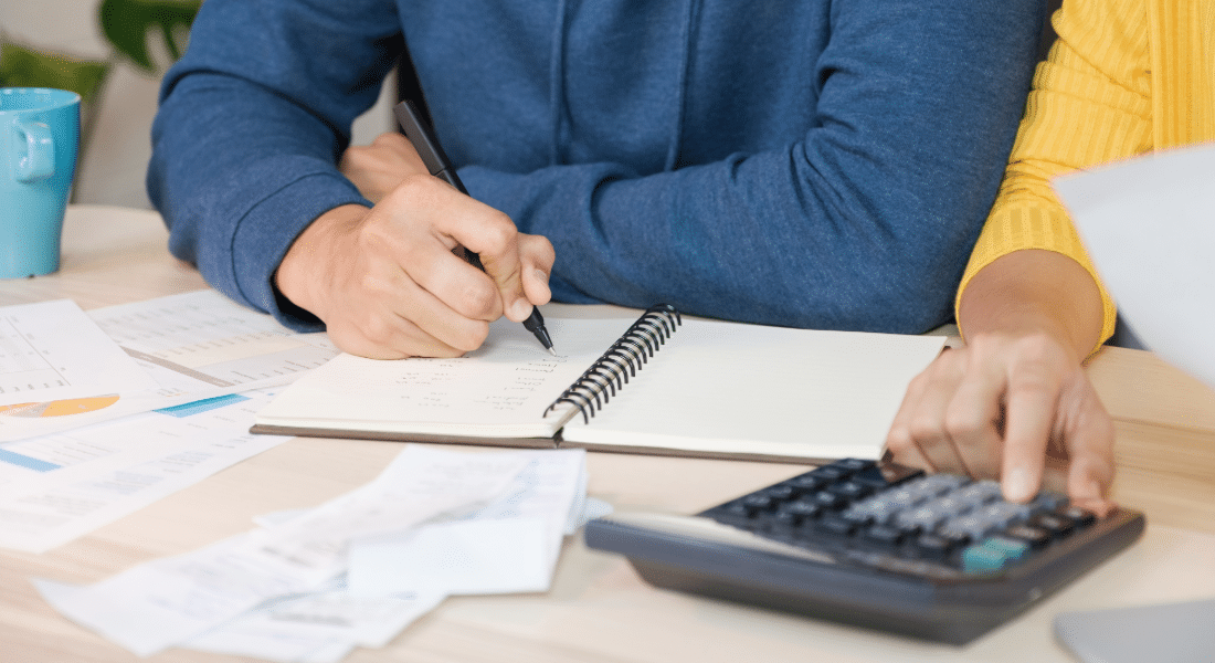 student-resources-hub-tuition-fees Students review tuition costs, fees, and payment information while calculating college expenses.