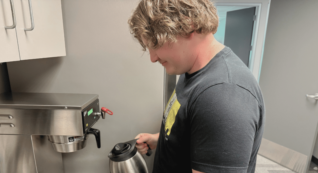 Capital Campaign 2026 Imagery-11 WSU Tech staff pours coffee from a commercial coffee brewer during hands-on training.