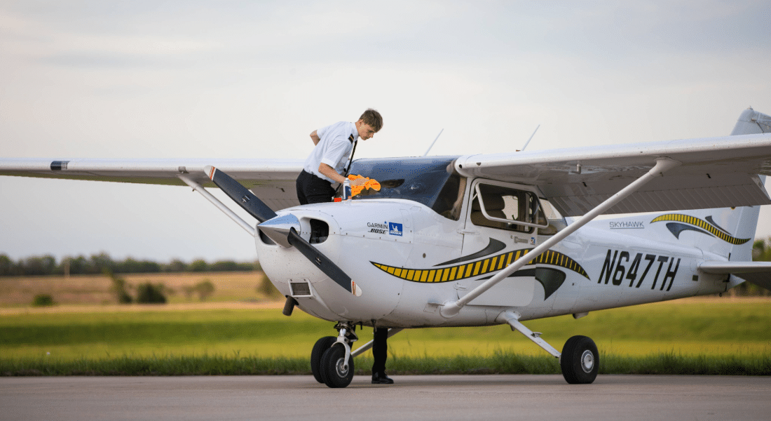 Capital Campaign 2026 Imagery-15 WSU Tech aviation student performs a preflight inspection on a training aircraft.